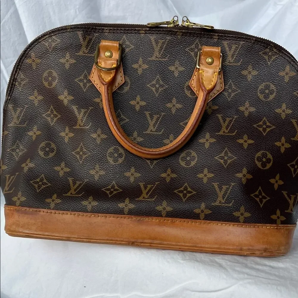 Louis Vuitton Alma PM Monogram Handbag